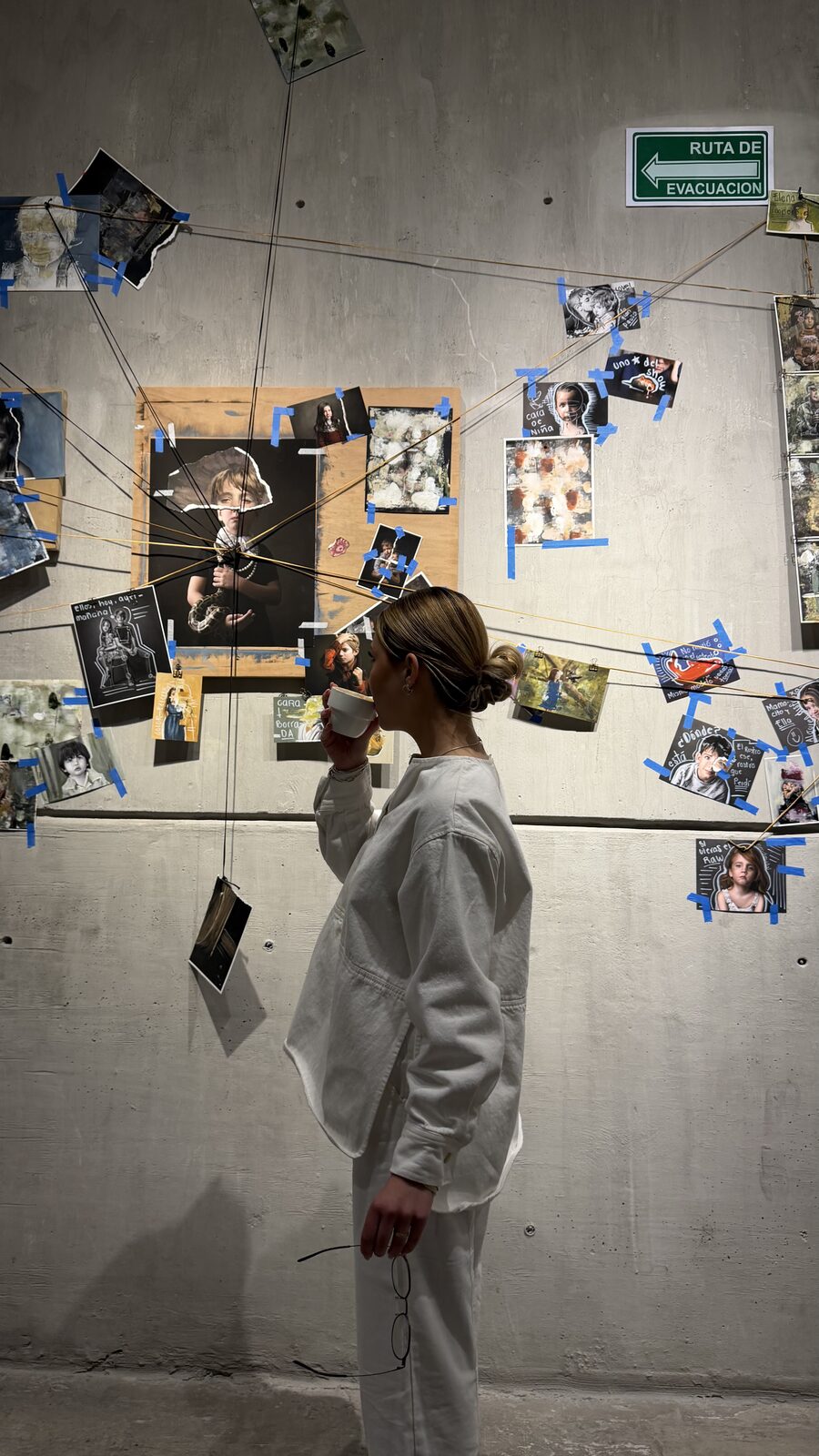 White suit at an art gallery